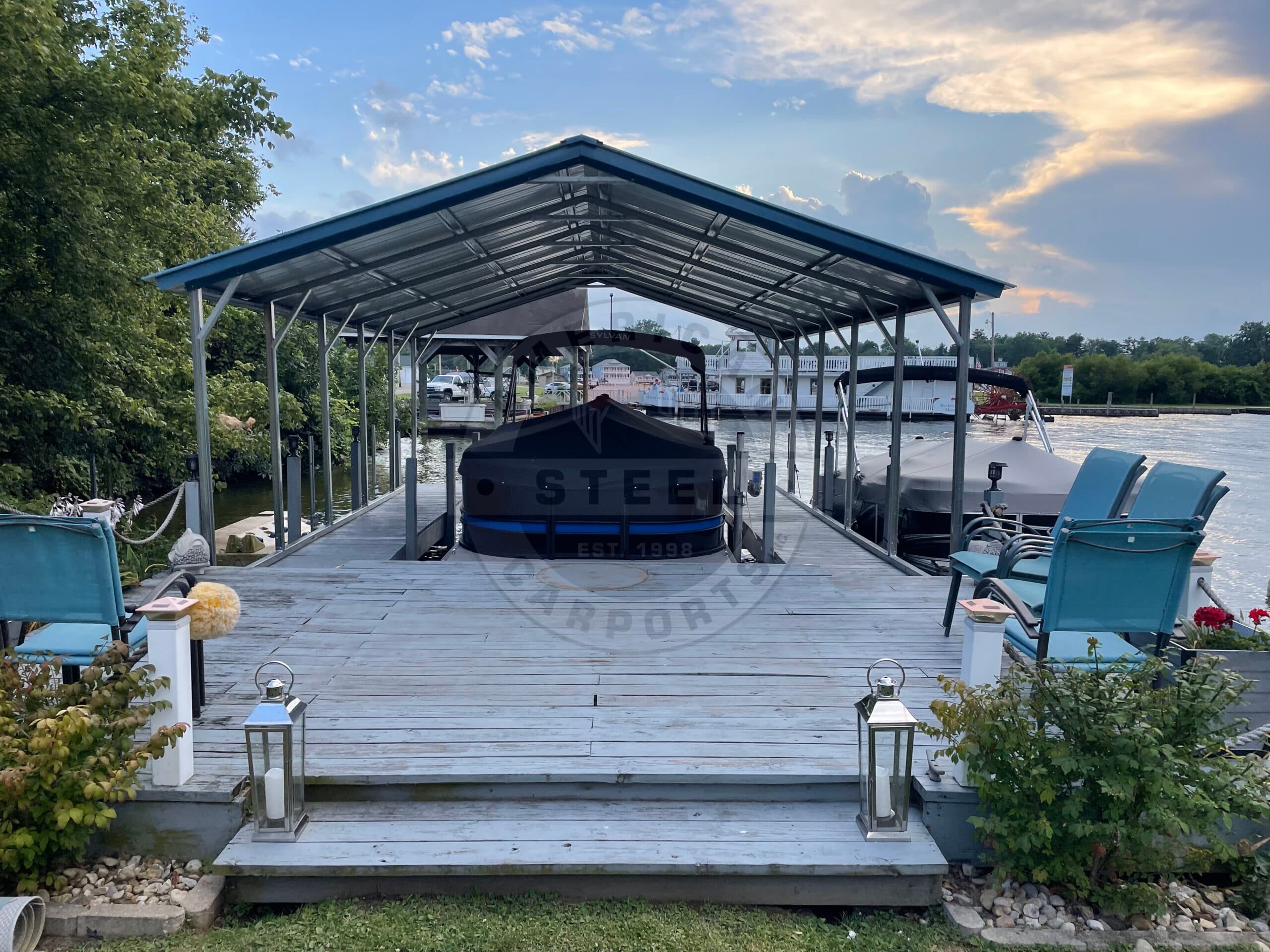 Tall steel cover protecting a boat on a trailer